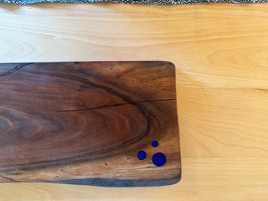 Vic walnut cutting board with blue epoxy