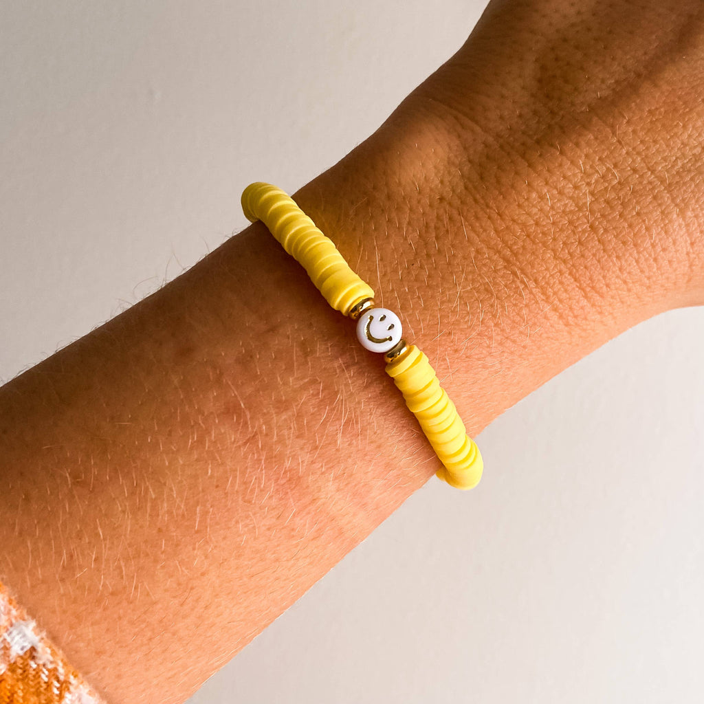 SMILEY FACE HEISHI BRACELET