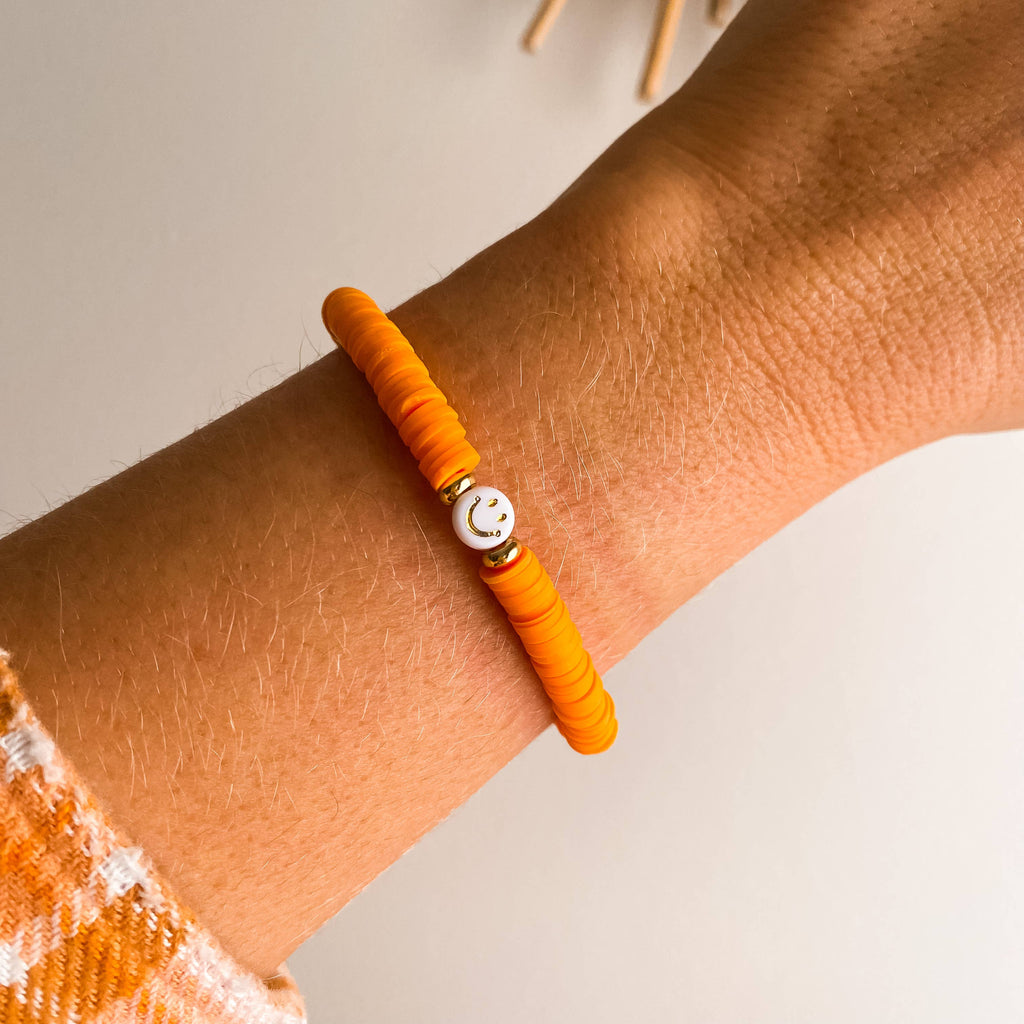 SMILEY FACE HEISHI BRACELET