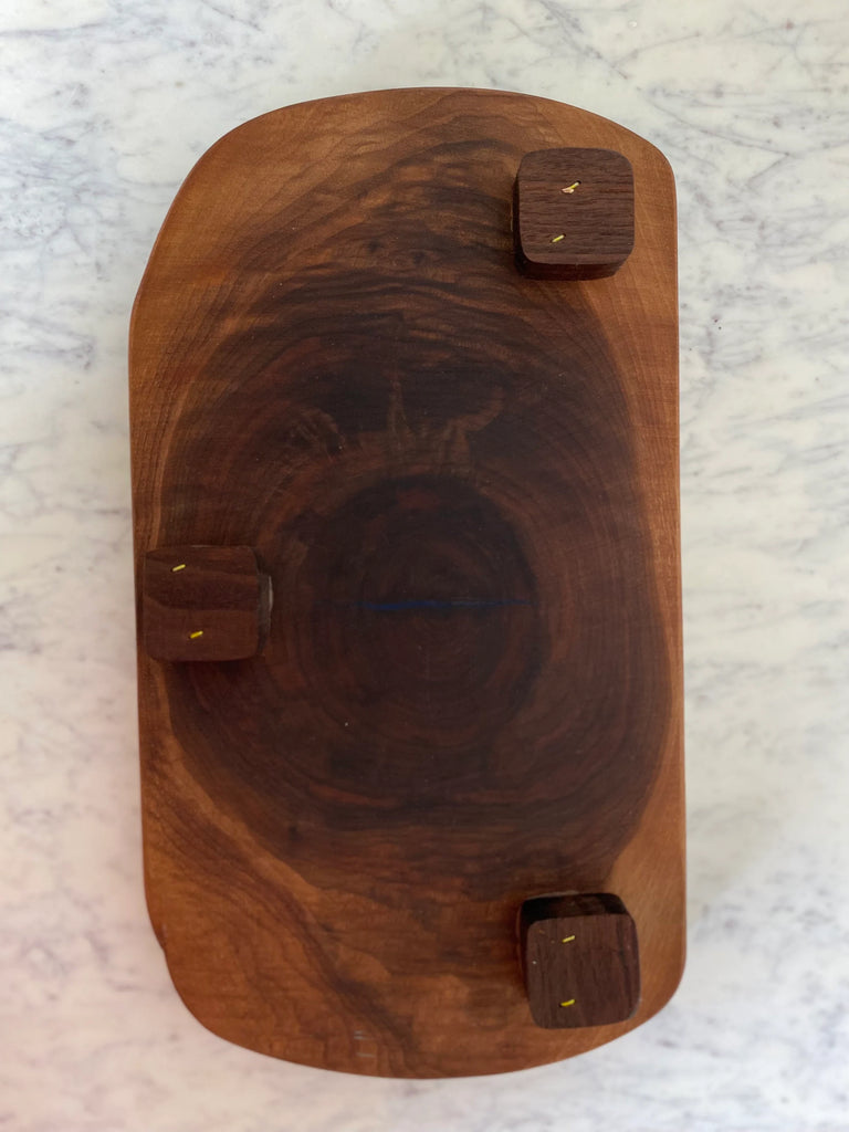 handcrafted dark walnut wood cutting board with epoxy