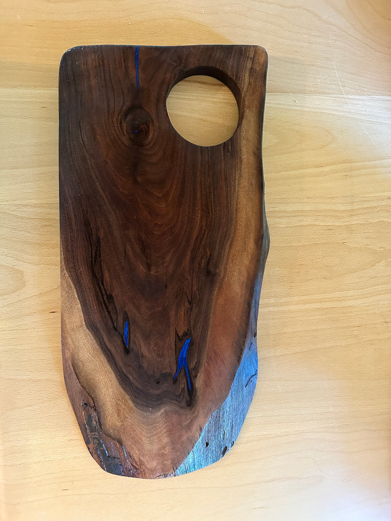Vic walnut cutting board with blue epoxy
