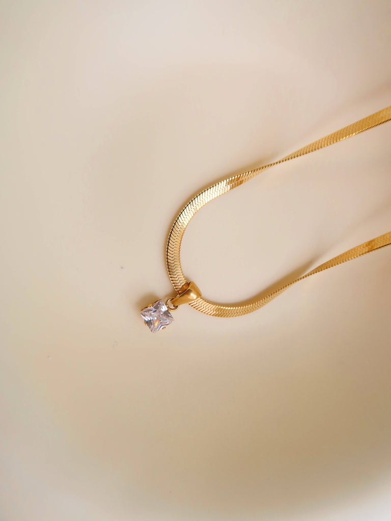 18k gold snake herringbone necklace with cz stone